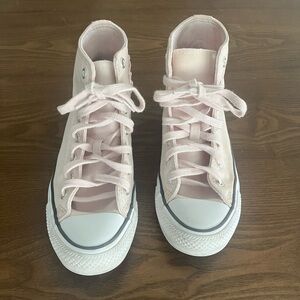 Pink high top converse with bow detailings